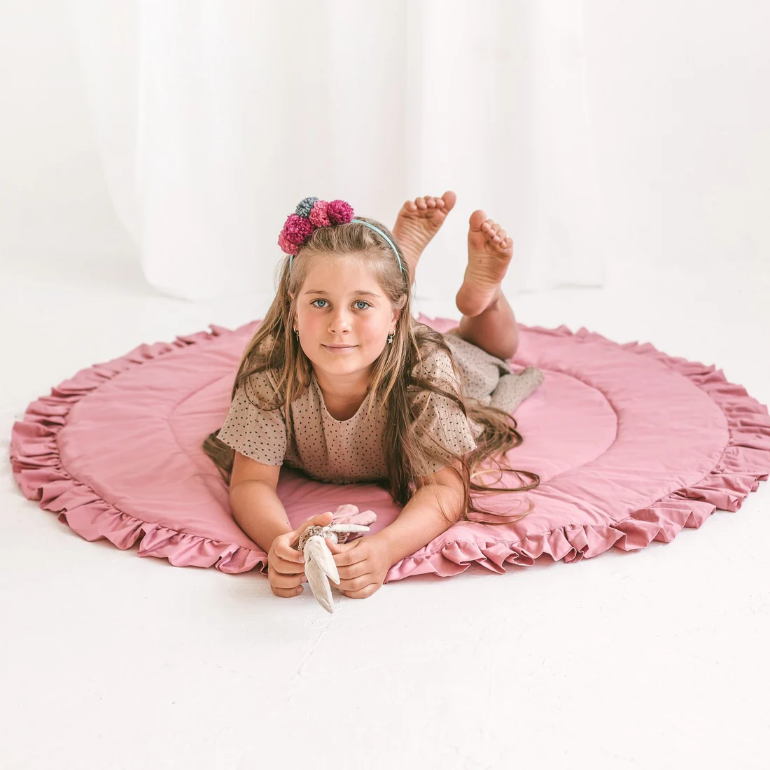 Tapis de jeu avec bordure à volants